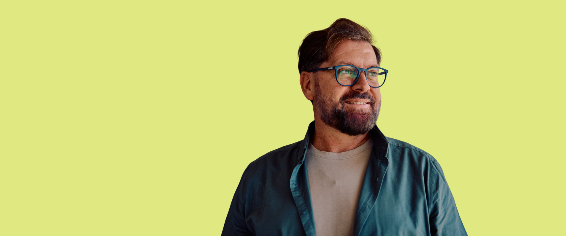 portrait of a 50 year old man smiling and looking optimistic portrait of a 50 year old man smiling and looking optimistic